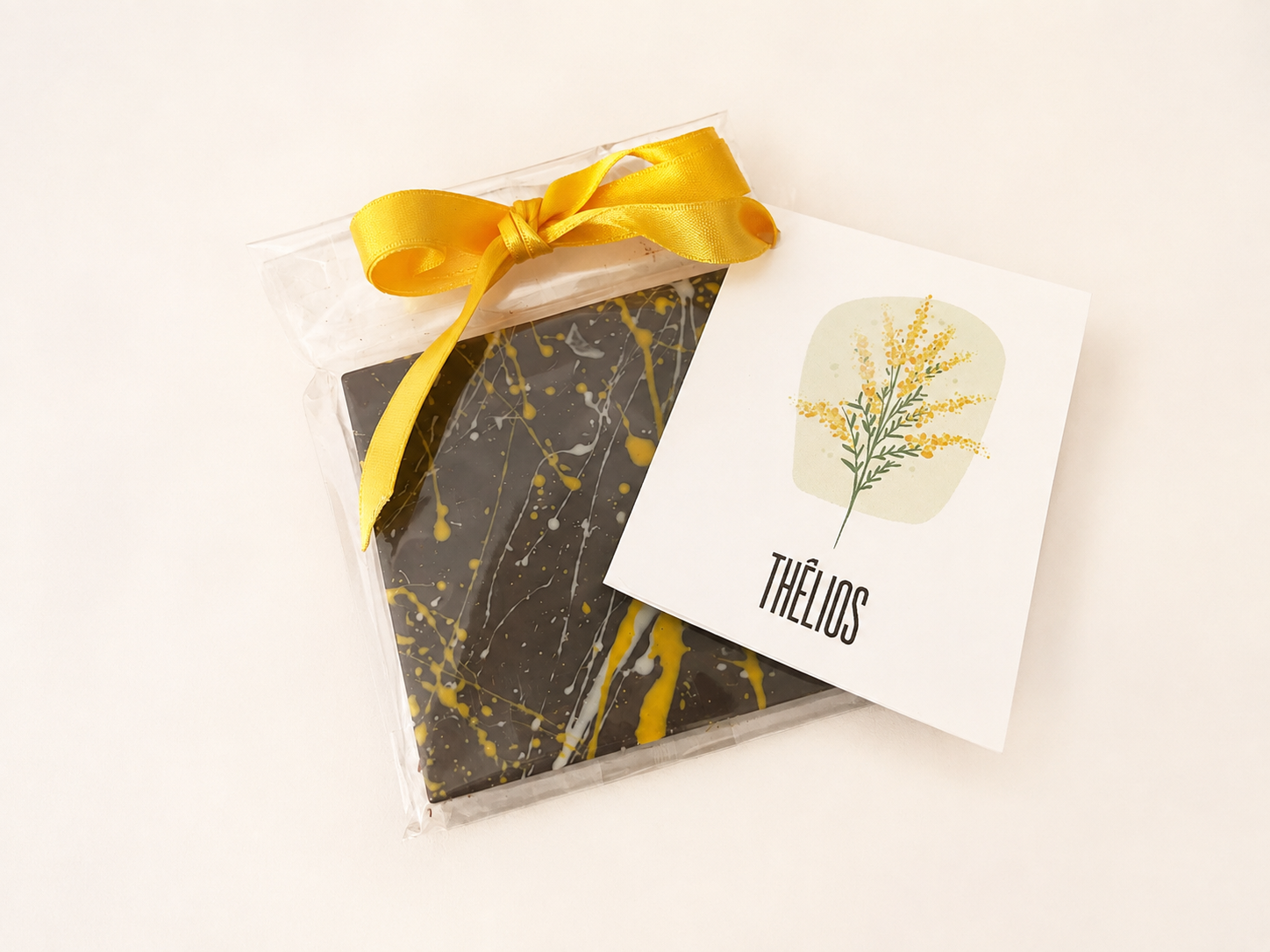 Tavoletta di cioccolato personalizzata con fiocco giallo e biglietto Thélios